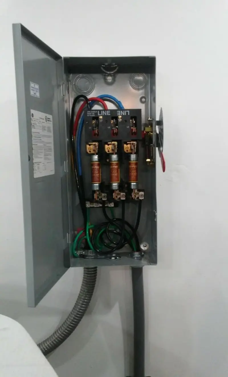 Three-phase disconnect switch installed for Smoke Detector Installation in Thetford